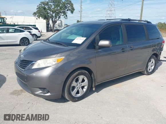 2014 Toyota Sienna LE AAS with VIN 5TDKK3DCXES432611, listed as a IAAI auction lot 40771635 with 214,145 mi miles and . Bid and sale history available at carsss.com. Image 18.
