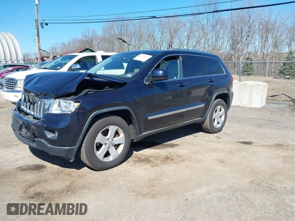 2011 Jeep Grand Cherokee Laredo with VIN 1J4RR4GG3BC670712, listed as a IAAI auction lot 41738127 with 93,714 mi miles and . Bid and sale history available at DreamBid. Image 17.