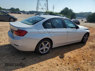 2014 BMW 3 Series 328i xDrive with VIN WBA3B5C51EF958576, listed as a Copart auction lot 62089375 with 148,140 mi miles and Salvage title. Bid and sale history available at DreamBid. Image 3.