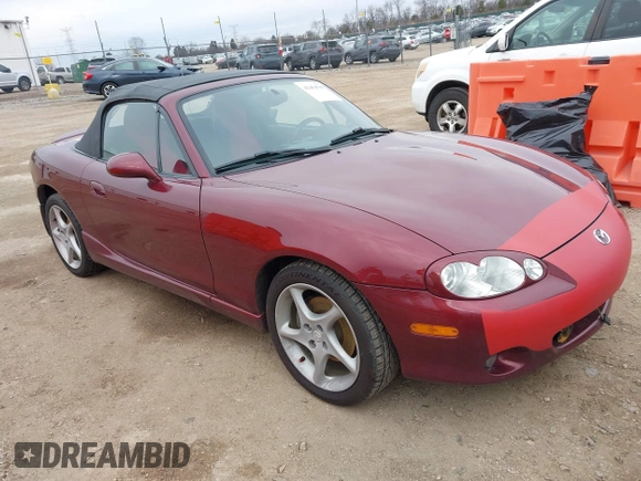 2003 Mazda MX-5 Miata Cloth z VIN JM1NB353X30308589, wystawiony jako IAAI lot #41454795 z przebiegiem 110 940 mil mil oraz . Historia ofert i sprzedaży dostępna na DreamBid. Obrazek 1.
