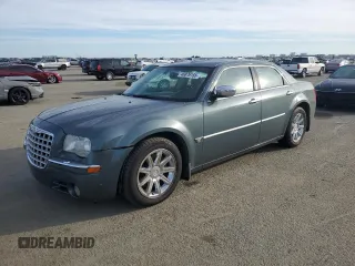2005 Chrysler 300 with VIN 2C3AA63H05H115601, listed as a Copart auction lot 46876155 with 145,816 mi miles and Salvage Title. Bid and sale history available at carsss.com. Image 1.