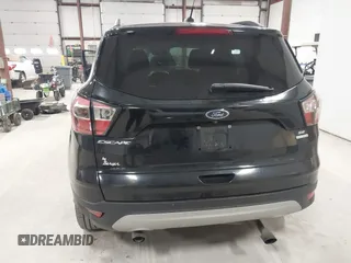 2017 Ford Escape SE with VIN 1FMCU0GD7HUB92091, listed as a IAAI auction lot 41984845 with 192,021 mi miles and . Bid and sale history available at DreamBid. Image 16.