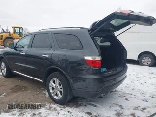 2013 Dodge Durango Crew z VIN 1C4SDJDT7DC684766, wystawiony jako IAAI lot #41277670 z przebiegiem 115 555 mil mil oraz . Historia ofert i sprzedaży dostępna na DreamBid. Obrazek 3.