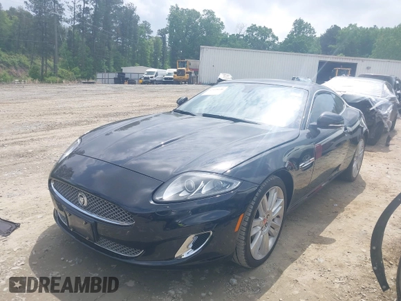 2012 Jaguar XK with VIN SAJWA4FB8CLB47049, listed as a IAAI auction lot 42118136 with 60,953 mi miles. Bid and sale history available at carsss.com. Image 17.