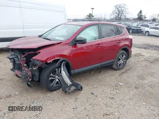 2018 Toyota RAV4 LE with VIN 2T3ZFREV9JW514778, listed as a IAAI auction lot 41202060 with 99,405 mi miles. Bid and sale history available at carsss.com. Image 17.