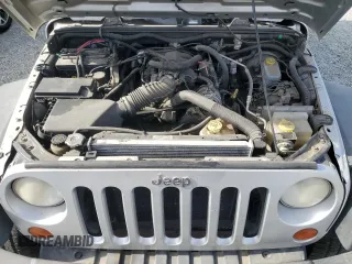 2007 Jeep Wrangler Unlimited X with VIN 1J8GB39157L142982, listed as a Copart auction lot 82050134 with 72,666 mi miles and Salvage Title. Bid and sale history available at DreamBid. Image 11.