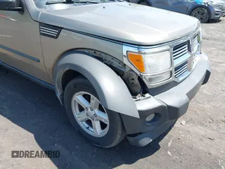2007 Dodge Nitro SXT with VIN 1D8GU28K67W700764, listed as a IAAI auction lot 42244697 with 80,078 mi miles and . Bid and sale history available at DreamBid. Image 6.