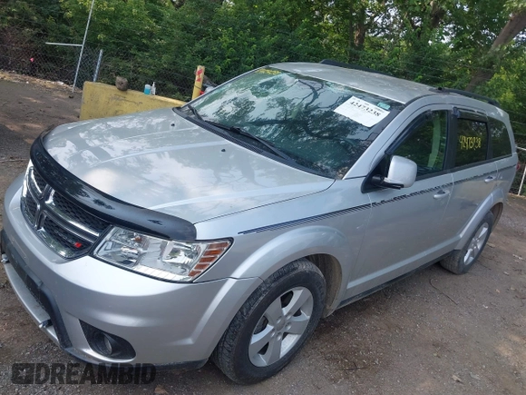 2012 Dodge Journey SXT with VIN 3C4PDDBG1CT323727, listed as a IAAI auction lot 42473238 with 77,035 mi miles and . Bid and sale history available at DreamBid. Image 6.