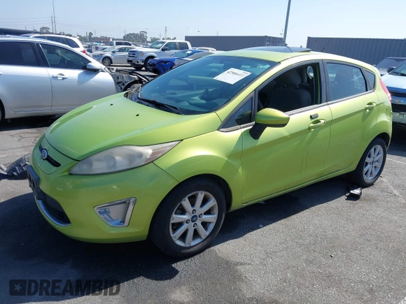 2011 Ford Fiesta SE z VIN 3FADP4EJ5BM138077, wystawiony jako IAAI lot #42506611 z przebiegiem Nie podano mil oraz . Historia ofert i sprzedaży dostępna na DreamBid. Obrazek 2.
