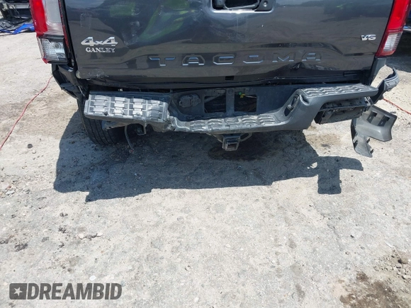 2021 Toyota Tacoma SR z VIN 3TMCZ5AN2MM392590, wystawiony jako IAAI lot #42178072 z przebiegiem 42 542 mil mil oraz . Historia ofert i sprzedaży dostępna na DreamBid. Obrazek 6.