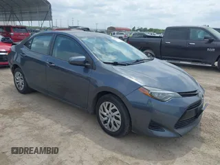 2019 Toyota Corolla L z VIN 5YFBURHE2KP884503, wystawiony jako IAAI lot #42047753 z przebiegiem 66 102 mil mil oraz . Historia ofert i sprzedaży dostępna na DreamBid. Obrazek 1.