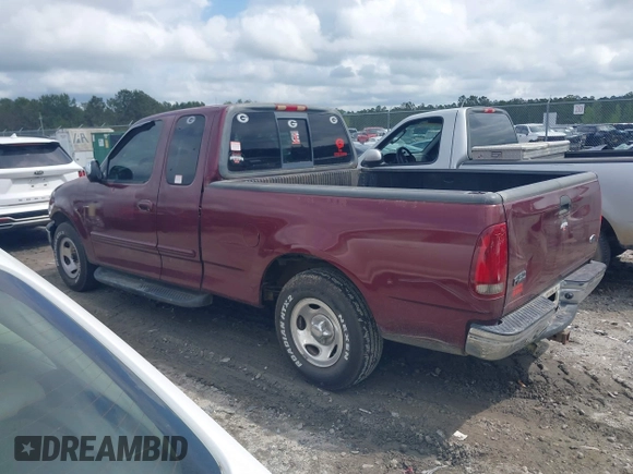 1999 Ford F-150 with VIN 1FTRX17W2XNB98256, listed as a IAAI auction lot 41931497 with Not Provided miles and . Bid and sale history available at DreamBid. Image 14.