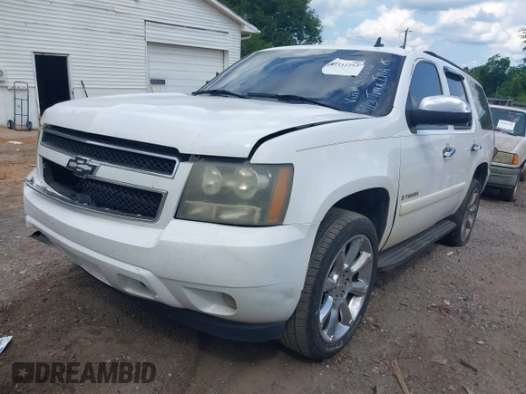 2007 Chevrolet Tahoe LS z VIN 1GNFC13J57R313666, wystawiony jako IAAI lot #42511253 z przebiegiem 374 689 mil mil oraz . Historia ofert i sprzedaży dostępna na DreamBid. Obrazek 2.