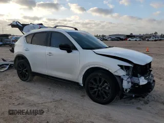 2024 Mazda CX-5 2.5 Carbon Turbo with VIN JM3KFBAY8R0443122, listed as a Copart auction lot 48023315 with 9,586 mi miles and Salvage Title. Bid and sale history available at carsss.com. Image 4.