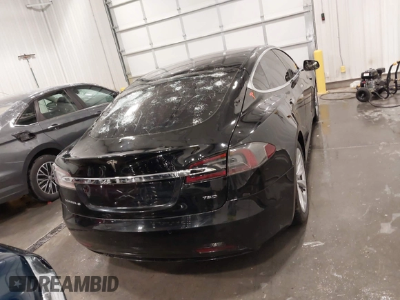 2018 Tesla Model S 75D with VIN 5YJSA1E2XJF248751, listed as a IAAI auction lot 42079081 with 75,904 mi miles and . Bid and sale history available at DreamBid. Image 16.