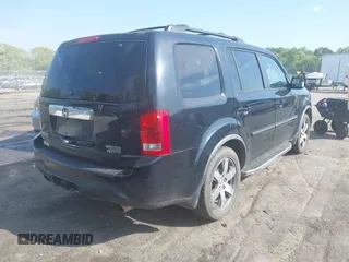 2012 Honda Pilot Touring with VIN 5FNYF4H95CB026191, listed as a IAAI auction lot 42021987 with 229,273 mi miles and . Bid and sale history available at DreamBid. Image 4.