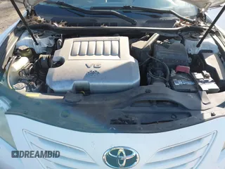 2009 Toyota Camry LE z VIN 4T1BK46K79U579024, wystawiony jako IAAI lot #41004813 z przebiegiem 154 621 mil mil oraz . Historia ofert i sprzedaży dostępna na DreamBid. Obrazek 10.
