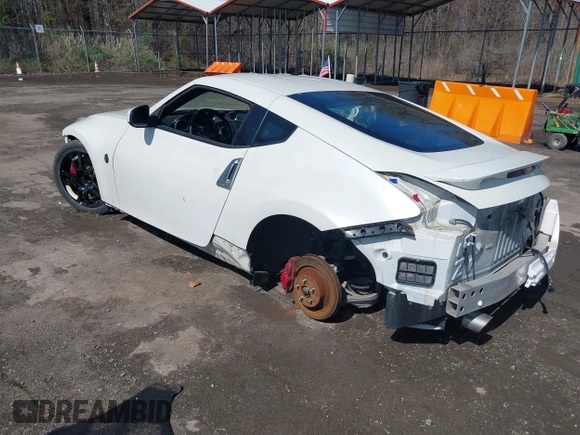 2014 Nissan 370Z with VIN JN1AZ4EH8EM634403, listed as a IAAI auction lot 41923568 with 137,676 mi miles. Bid and sale history available at carsss.com. Image 3.