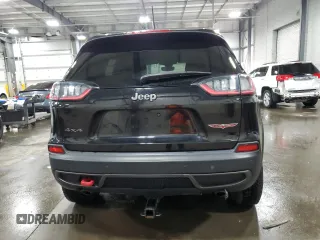 2020 Jeep Cherokee Trailhawk with VIN 1C4PJMBX2LD638678, listed as a Copart auction lot 52197785 with 103,724 mi miles and Salvage title. Bid and sale history available at DreamBid. Image 6.
