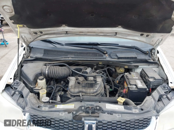 2013 Dodge Grand Caravan SE with VIN 2C4RDGBG8DR505844, listed as a IAAI auction lot 42139152 with 206,399 mi miles and . Bid and sale history available at DreamBid. Image 10.