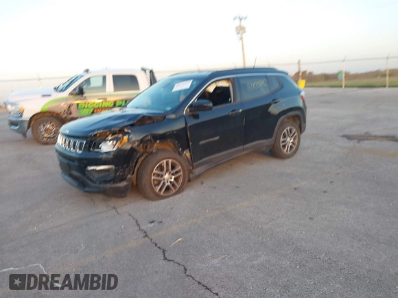2017 Jeep Compass Latitude with VIN 3C4NJDBB8HT664781, listed as a IAAI auction lot 40670412 with 125,593 mi miles. Bid and sale history available at carsss.com. Image 2.