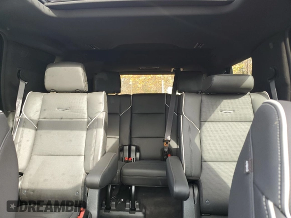 2024 Cadillac Escalade 4WD Premium Luxury with VIN 1GYS4BKL1RR181502, listed as a Copart auction lot 77155704 with 6,588 mi miles and Salvage title. Bid and sale history available at DreamBid. Image 10.