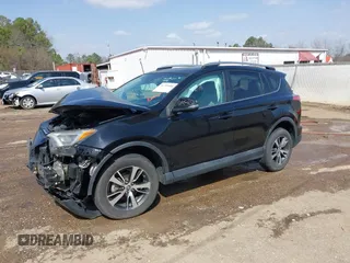 2018 Toyota RAV4 XLE with VIN 2T3WFREVXJW444002, listed as a IAAI auction lot 41795600 with 115,120 mi miles. Bid and sale history available at carsss.com. Image 2.