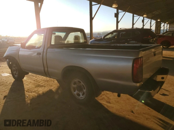 2000 Nissan Frontier XE z VIN 1N6DD21S5YC340513, wystawiony jako Copart lot #89018755 z przebiegiem 237 418 mil mil oraz Szkoda całkowita • Salvage title. Historia ofert i sprzedaży dostępna na DreamBid. Obrazek 2.