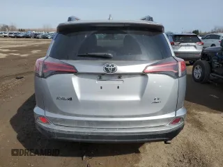 2018 Toyota RAV4 LE with VIN 2T3BFREV9JW754527, listed as a Copart auction lot 48119415 with 217,777 mi miles and Salvage Title. Bid and sale history available at carsss.com. Image 6.