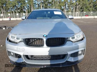 2016 BMW 4 Series 428i xDrive with VIN WBA4C9C5XGG135893, listed as a IAAI auction lot 41976541 with 86,987 mi miles and . Bid and sale history available at carsss.com. Image 13.