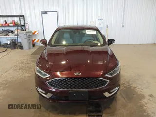 2017 Ford Fusion Titanium with VIN 3FA6P0K91HR171231, listed as a IAAI auction lot 41131312 with 115,265 mi miles. Bid and sale history available at carsss.com. Image 12.