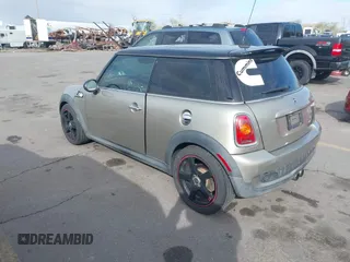 2009 MINI Hardtop S with VIN WMWMF73569TW87929, listed as a IAAI auction lot 42057214 with 164,922 mi miles and . Bid and sale history available at DreamBid. Image 3.