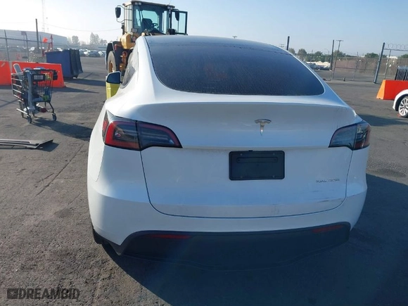 2023 Tesla Model Y Long Range with VIN 7SAYGDEE9PF618720, listed as a IAAI auction lot 41643062 with NaN miles. Bid and sale history available at carsss.com. Image 17.