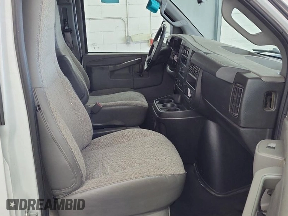 2020 Chevrolet Express Cargo Van with VIN 1GCWGAFGXL1252692, listed as a IAAI auction lot 42023073 with 63,960 mi miles. Bid and sale history available at carsss.com. Image 1.