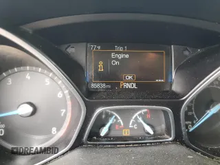 2018 Ford Focus SE z VIN 1FADP3F27JL250591, wystawiony jako Copart lot #54989245 z przebiegiem 85 838 mil mil oraz Szkoda całkowita • Salvage title. Historia ofert i sprzedaży dostępna na DreamBid. Obrazek 9.