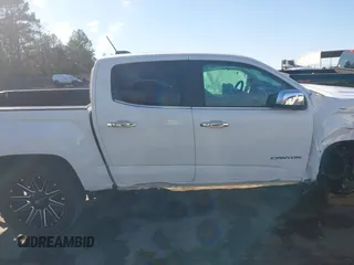 2019 GMC Canyon 4WD SLT with VIN 1GTG6DEN8K1109070, listed as a IAAI auction lot 41394345 with 67,357 mi miles. Bid and sale history available at carsss.com. Image 14.