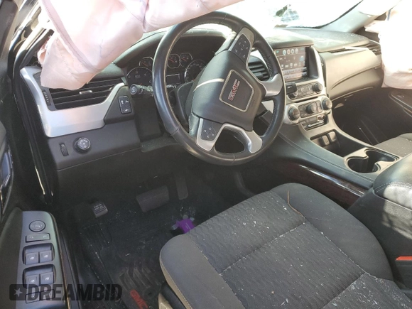 2019 GMC Yukon SLE with VIN 1GKS1AKC6KR302642, listed as a Copart auction lot 41510715 with 97,906 mi miles and Salvage Title. Bid and sale history available at carsss.com. Image 8.