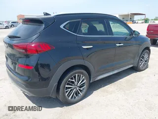 2021 Hyundai Tucson Ultimate with VIN KM8J33ALXMU289579, listed as a IAAI auction lot 42027719 with 95,989 mi miles and . Bid and sale history available at DreamBid. Image 4.