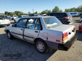 1984 Toyota Corolla с VIN JT2AE83E8E3091481, выставлен на аукционе Copart как лот 74945744 с пробегом 145 163 миль миль и Чистый • Clean title. История ставок и продаж доступна на DreamBid. Изображение 2.