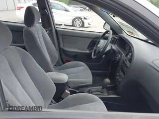 2004 Hyundai Elantra GLS z VIN KMHDN46D14U790939, wystawiony jako IAAI lot #42194909 z przebiegiem 108 180 mil mil oraz . Historia ofert i sprzedaży dostępna na DreamBid. Obrazek 5.