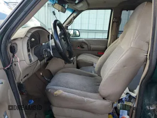 2003 GMC Safari with VIN 1GKEL19X83B512525, listed as a Copart auction lot 79059984 with 122,800 mi miles and Salvage Title. Bid and sale history available at carsss.com. Image 7.