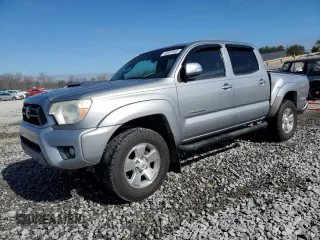 2014 Toyota Tacoma with VIN 3TMLU4EN4EM156401, listed as a Copart auction lot 46001045 with 124,289 mi miles and Salvage Title. Bid and sale history available at carsss.com. Image 1.