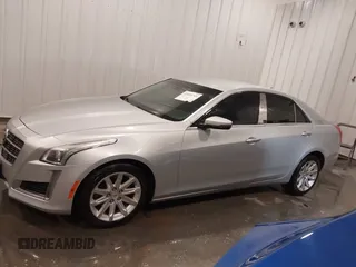 2014 Cadillac CTS Luxury AWD with VIN 1G6AX5SX3E0181029, listed as a IAAI auction lot 41895745 with 68,799 mi miles and . Bid and sale history available at DreamBid. Image 14.