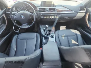 2013 BMW 3 Series 320i xDrive with VIN WBA3C3C51DF980707, listed as a Copart auction lot 63655825 with 148,487 mi miles and Clean title. Bid and sale history available at DreamBid. Image 8.
