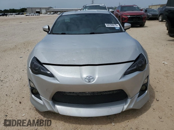 2013 Scion FR-S z VIN JF1ZNAA11D1704767, wystawiony jako Copart lot #52250275 z przebiegiem 82 246 mil mil oraz Czysty tytuł • Clean title. Historia ofert i sprzedaży dostępna na DreamBid. Obrazek 5.