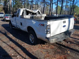 2015 Ford Super Duty F-250 SRW XLT with VIN 1FT7X2BT2FED37097, listed as a IAAI auction lot 41084977 with 224,317 mi miles. Bid and sale history available at carsss.com. Image 3.