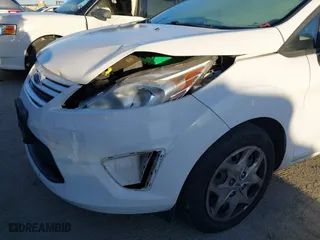 2013 Ford Fiesta S with VIN 3FADP4AJXDM156194, listed as a IAAI auction lot 41870811 with 89,446 mi miles. Bid and sale history available at carsss.com. Image 12.