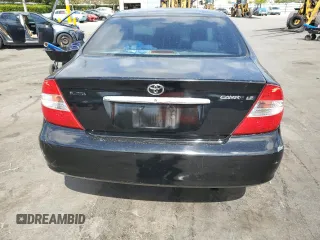 2004 Toyota Camry LE with VIN 4T1BF32K74U071049, listed as a Copart auction lot 53807535 with 151,805 mi miles and Salvage Title. Bid and sale history available at carsss.com. Image 6.