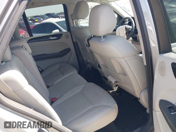 2015 Mercedes-Benz M 350 with VIN 4JGDA5JB8FA562500, listed as a IAAI auction lot 41932318 with 117,512 mi miles and . Bid and sale history available at DreamBid. Image 8.