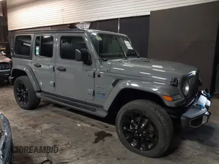 2022 Jeep Wrangler Unlimited Sahara with VIN 1C4JJXP66NW198723, listed as a IAAI auction lot 41368728 with 31,814 mi miles and . Bid and sale history available at DreamBid. Image 1.